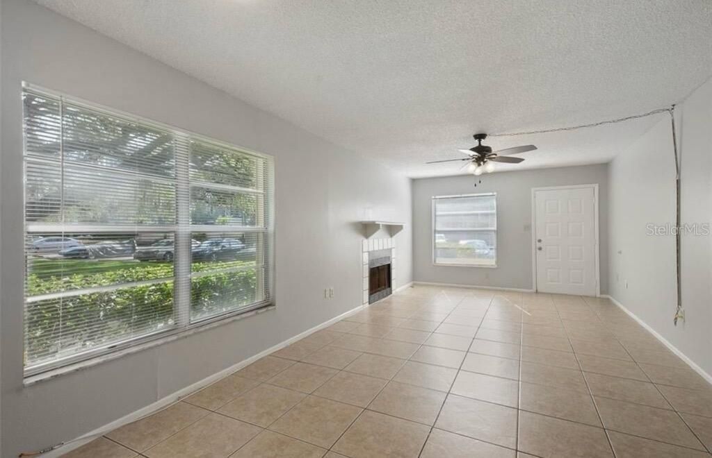 Photo of 14227 Shadow Moss Lane #101, Tampa, FL 33613 (MLS # O6392312)
