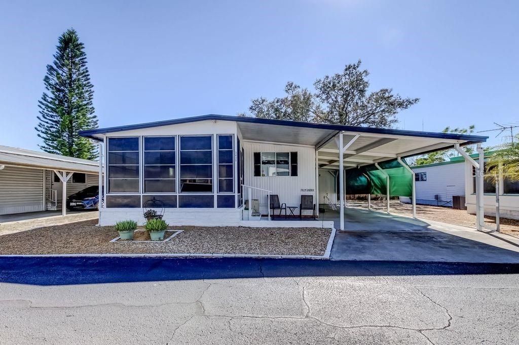 Photo of 3430 Tiki Drive, Holiday, FL 34691 (MLS # TB8466537)