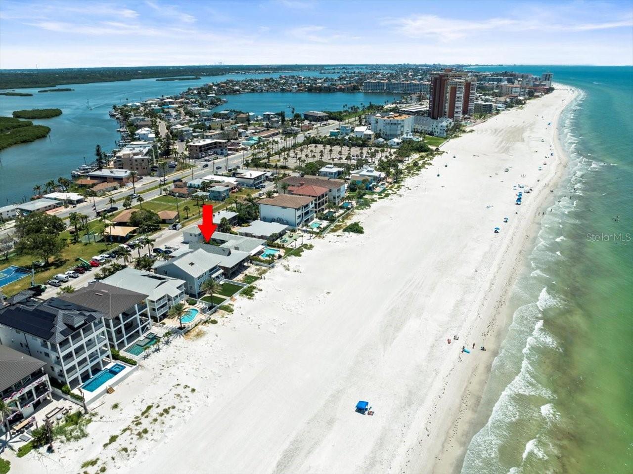 A rare opportunity has arrived in Redington Shores: a direct Gulf-front property offering unparalleled potential for both luxury living and lucrative investment. For the first time in over 30 years, this prime piece of real estate is available to the market. Currently zoned as a condo, the property has been cherished as a family vacation retreat, with two spacious units totaling 2,750 sq. ft. of living space—each featuring 3 bedrooms and 2 bathrooms. The existing structure boasts a large parking pad, two one-car garages, and under-building storage, adding functionality to its enviable beachfront location. There is over 50 feet of Gulf frontage and a Sea Wall Already in place and the City provides a Beach scraper to keep the beach front view clean and free of debris.
Another rare advantage: this property does not back up to Gulf Boulevard, providing a quieter, more private atmosphere with Constitution Park buffering the rear of the property, which has a dog walk, playground and town sponsored cookouts and events for residents. Just steps away, you’ll find the beach trolley, bus stops, local favorites like Candy Kitchen, Koko nuts Grill, Friendly Tavern, and Broke N Board, plus easy access to restaurants, coffee shops, and the famous Beach Pizza. The lot itself, just under a quarter acre (see attached survey), offers impressive development potential. The City of Redington Shores allows underground parking/storage and up to two floors of buildable space, with the potential for a third floor with variance approval.
The possibilities are endless: design a spectacular 2,500+ sq. ft. Gulf-front penthouse for your own use while generating income from luxury rental units below, or create a boutique Gulf-front development perfectly tailored for today’s high-end buyers and investors. Possibly two smaller buildings with a variance? All this, while being only 30 minutes to Tampa—home of the Buccaneers, Tampa Bay Lightning, the Rays, fine dining, international shopping, Broadway-caliber theater, and an international airport. Just minutes away, St. Pete offers a vibrant nightlife and its iconic new pier, while Clearwater Beach adds yet another world-class destination to the mix.