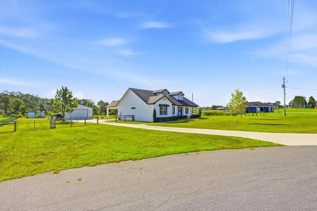 Photo of 18165 Bayamon Avenue, Polk City, FL 33868 (MLS # B4902373)