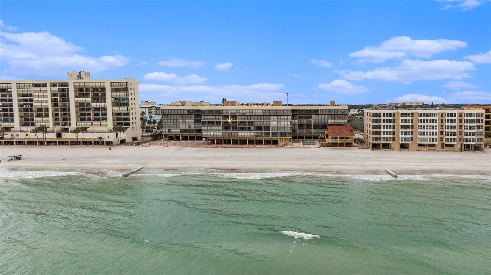 TRUE BEACHFRONT VALUE UNDER $700K — UNOBSTRUCTED GULF VIEWS (PET FRIENDLY) + RARE EXTRAS!
Step into Unit 308 at Surfside South and experience stunning, panoramic beach views the moment you walk through the door — no angled windows, no partial obstructions, no view of parking lot, just direct, front-row Gulf scenery. This is the only true beachfront-view condo under $700K in Madeira Beach and surrounding beach towns. Unlike others, this unit comes with the best covered garage parking spot in the building (right next to the elevator) and is the only one on its floor with a private storage room for added convenience. Inside, the home is exceptionally well maintained with a seamless flow of staggered-set porcelain tile, granite countertops, quality cabinetry with pantry, plantation shutters, and 2 beautifully maintained bathrooms — including a walk-in shower in the primary suite and a tub in the guest bath.
Located in the Surfside South Condo community, this pet-friendly complex offers direct beach access, a screened-in lanai with breathtaking Gulf views, and a heated pool and spa currently being rebuilt. Additional amenities include keyed lobby entrance, elevators and plenty of guest parking. The HOA includes cable, water, sewer, trash, building insurance, and more. The building features concrete block construction and has seen several recent upgrades including a new roof (2017–2018), updated electrical panels, and fresh exterior paint in progress.
Enjoy walkability to shops, dozens of restaurants, and beach bars directly across the street — with John’s Pass Village just minutes away and Downtown St. Pete or Tampa International Airport a short drive. Whether you're searching for a beach getaway, income property, or your next Florida home, this unit delivers unmatched value, location, and lifestyle. Priced to sell — don’t miss it!