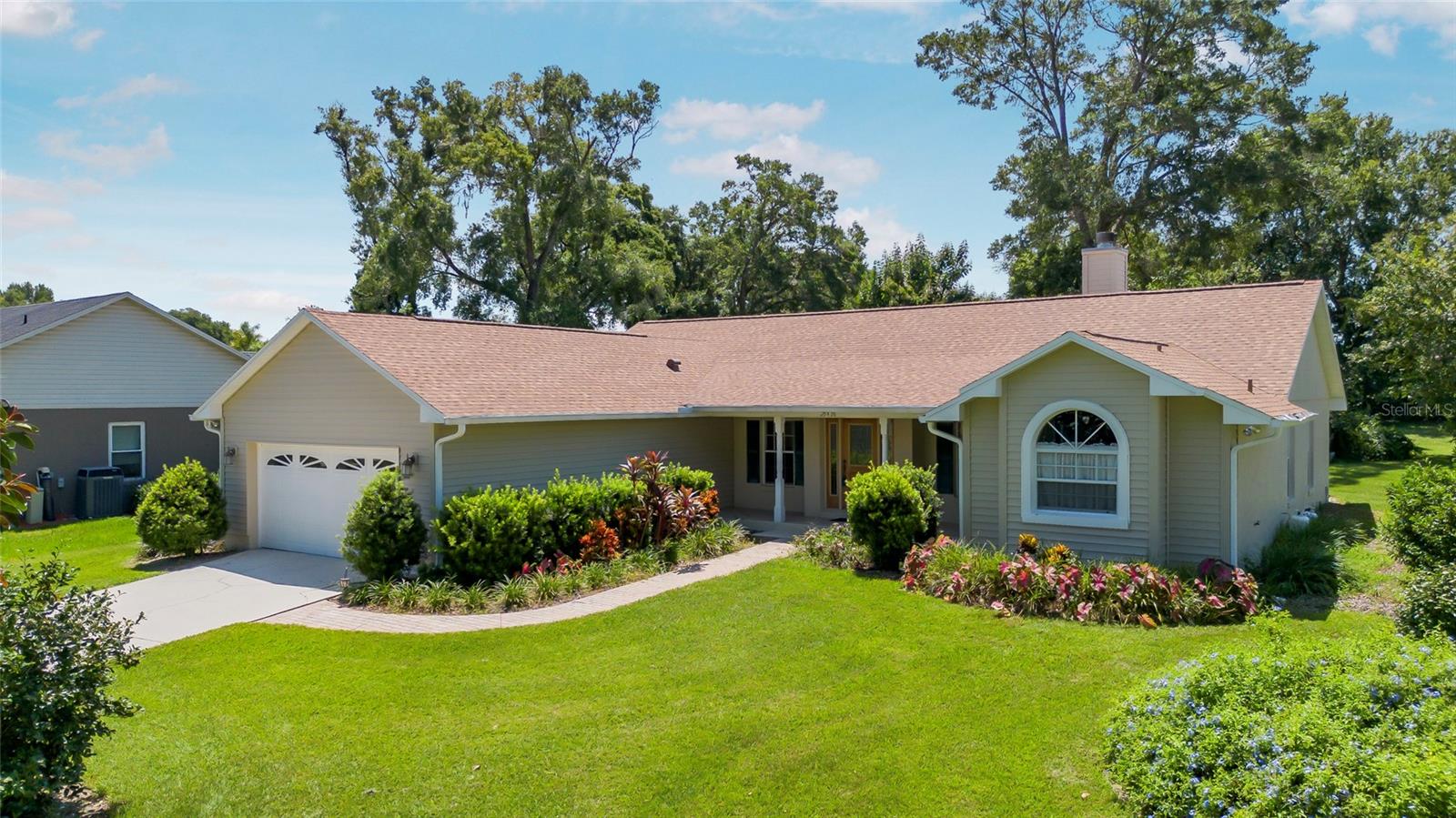Nestled in the peaceful Sundance Ridge community of Sorrento, this delightful 3-bedroom, 2-bathroom home
blends cozy comfort with tranquil surroundings. Situated on a half-acre lot with mature trees lining the front
and backyard, it includes a 2-car garage, a screened porch ideal for savoring the serene backyard, and a
welcoming unscreened front porch. The home features a split floor plan, a spacious family room with a gas
fireplace, and a primary bathroom with a claw foot tub for a relaxing escape from the day. High efficiency AC
with three zones, central vacuum system, deep well and porch screens replaced in July. Conveniently located
just minutes from Highway 429, it provides easy access to Central Florida’s attractions. The charming town of
Mount Dora, with its unique restaurants, boutique shops, and vibrant annual festivals, is just a short drive
away. Lovingly maintained by its original owners, properties in Sundance Ridge are a rare gem and highly
sought after.