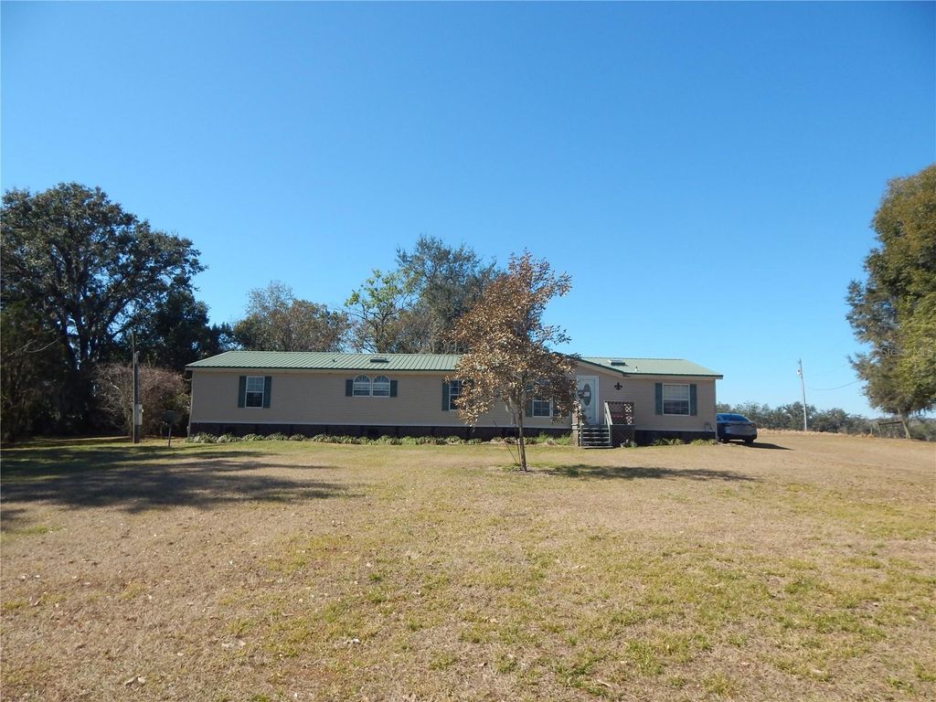 Photo of 14453 Hudson Lane, Dade City, FL 33525 (MLS # TB8474428)