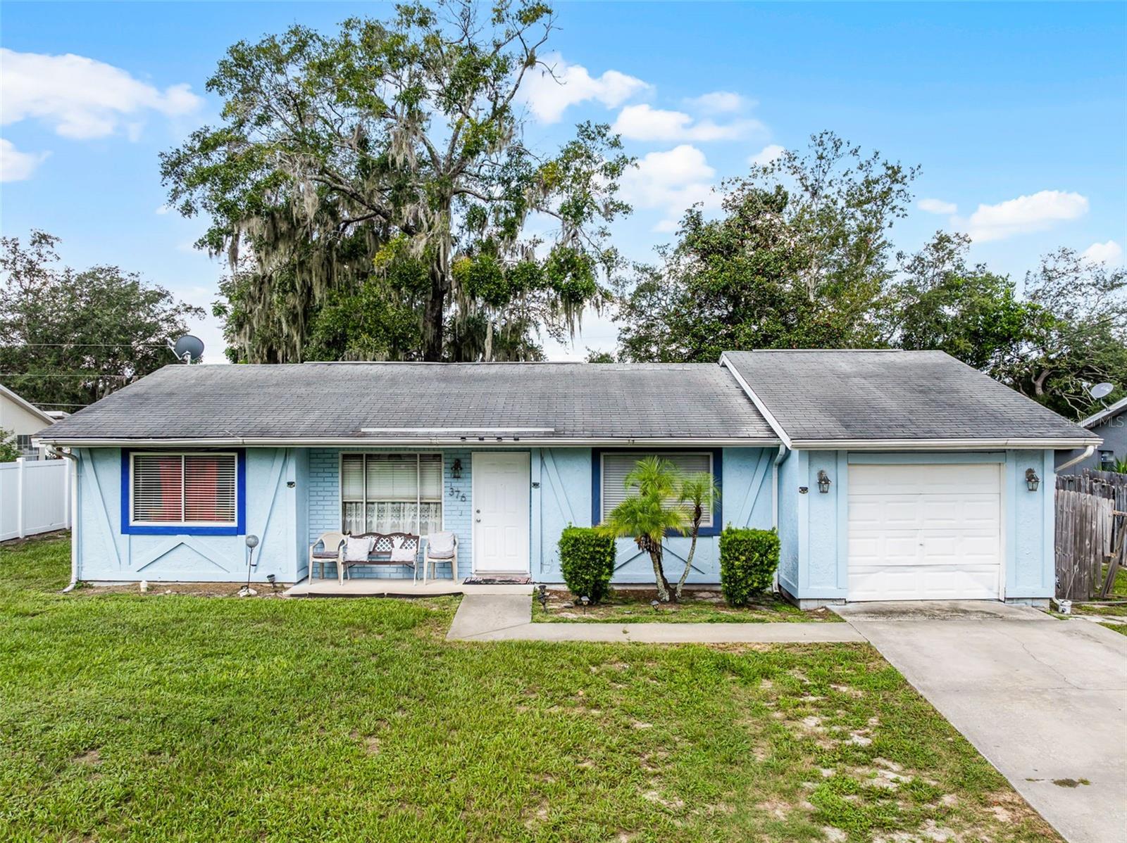 Opportunity is knocking, will you answer it? Whether you are looking for your first home or to add another to your investment portfolio, 376 Providence Blvd should be at the top of your list now. Only 5 minutes from I4, minutes to Publix and countless other amenities, this 2 bedroom, 2 bathroom home is ready for its next owners. Laminate flooring greets you at the threshold, and the open family room & adjoining dining room make a convenient centerpiece, both just steps away from your kitchen. The front bedroom, already updated with tiling flooring, has direct access to its own en-suite bathroom; easily accessible for guests, and is yet very private from the primary bedroom. Located on the opposite side of the home is your primary bedroom, already updated with tile flooring as well, large walk-in closet and its own private bathroom. Past the kitchen you find yourself in a very convenient and expansive inside laundry room; with ample space for a full size washer and dryer and extra storage. Do you like to host family get-togethers and are the "go-to" family for holidays....well this massive backyard will not disappoint in any way! Imagine those fabulous BBQ's with your friends and family, and if you ever wanted...picture the pool that you can add here with this wide open space!  HVAC installed in 2016 | Water Heater installed in 2019 | NO HOA | ZERO CARPET | Updated plumbing & electrical. Don't you deserve to walk into a home everyday that you are excited about?