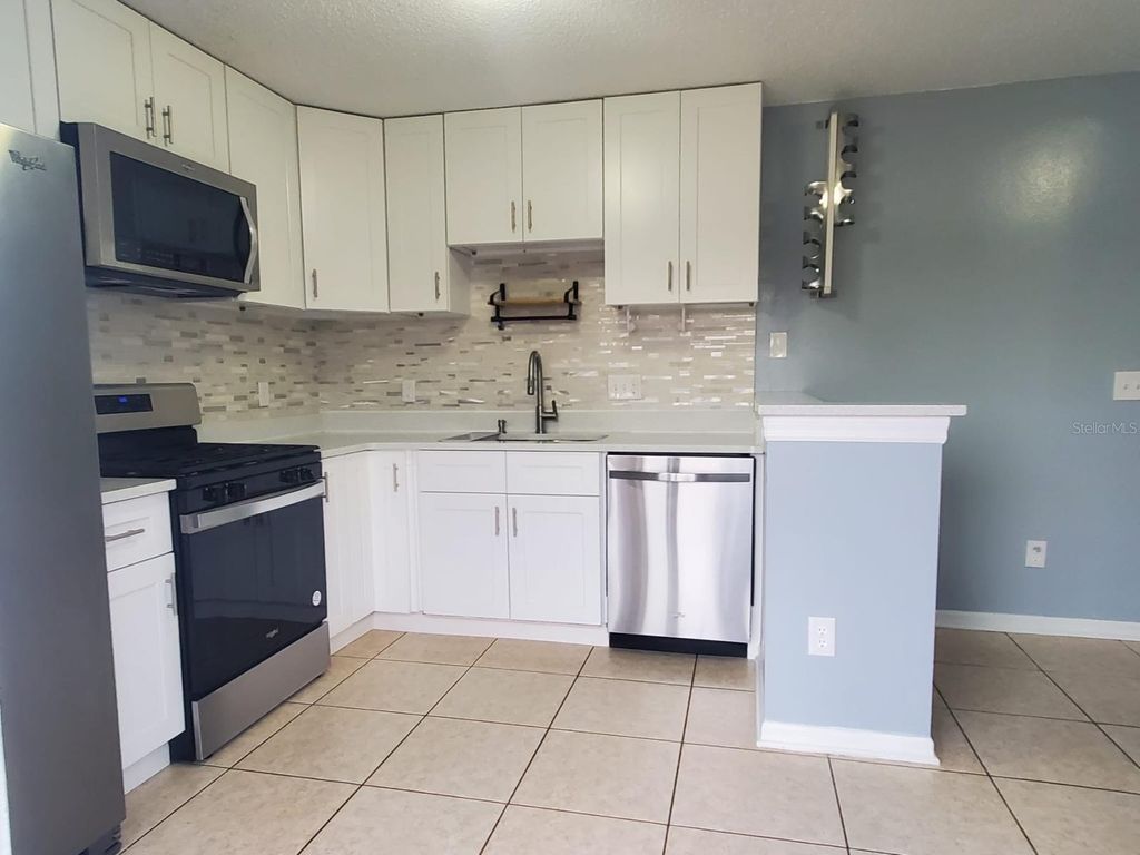 Photo of 3252 Huntwicke Boulevard, Davenport, FL 33837 (MLS # S5152859)