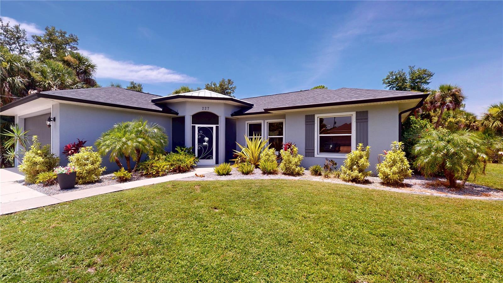 Welcome to 227 Berthoud Street in Port Charlotte, where comfort and functionality meet Florida charm. Situated on an OVERSIZED .34-acre CORNER LOT, this beautifully maintained 3-bedroom, 2-bath home offers 1,789 square feet of living space and a thoughtfully designed split, open floor plan.
The spacious 22x17 living room is filled with natural light and features triple sliding doors that open to a covered lanai and sparkling HEATED POOL—perfect for indoor-outdoor living. Both the primary suite and third bedroom also offer direct access to the pool area, enhancing the home’s effortless flow.
The kitchen includes granite countertops, a generous breakfast bar, a built-in desk, and stainless steel appliances installed in 2021. Just off the kitchen, you’ll find a convenient laundry area with added cabinetry and a large pantry. The tile flooring in the main living areas and bathrooms is durable and easy to maintain, while the three bedrooms are finished with soft, berber carpeting.
Notable updates include a NEW ROOF and GUTTERS (2022), rescreened pool cage and fresh exterior paint (2023), and new toilets, faucets, washer and dryer, and a WHOLE-HOUSE water filtration system (2021). HURRICANE SHUTTERS provide added peace of mind, and a separate outdoor grill area expands your entertaining space. There's also a storage shed for extra convenience.
The property has been beautifully landscaped within the past three years, creating a lush, welcoming setting. Located in Northwest Port Charlotte, just under a mile from North Port, you'll be close to the Atlanta Braves Spring Training stadium and the Tampa Bay Rays Training Facility, with shopping, dining, and recreation all within easy reach. Let's not forget being close to the beautiful Gulf Coast BEACHES, walking/biking TRAILS and public boat ramps.
If you're looking for a move-in-ready Florida pool home with space to spread out and updates already done, this one checks all the boxes. View the home online by clicking on the link for a 3D Tour of the home. Furnishings are available under a separate contract.