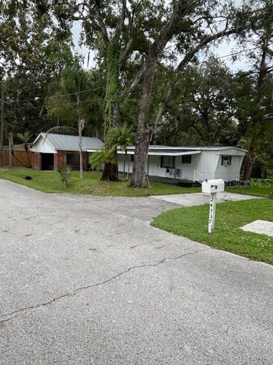 Freshly renovated 3 bedrooms 2 bathrooms mobile home with almost 1 acre of land in Land O Lakes, Florida for rent. New stainless-steel appliances with stainless steel single basin sink, shaker cabinets, solid wood butcher block countertop, laminate flooring, light fixtures with ceiling fans, bathroom cabinets with fixtures and three new window unit's A/C. There're two spacious storage sheds in the backyard for additional storage with a covered area for picnic and plenty of yard space for your recreational vehicles. Also, this community has no HOA, and the property is located on the dead-end street. Conveniently located near Tamp Premium Outlets, Wiregrass Mall, The Grove Mall and Crates, shopping, schools, college, hospitals, mayor highways I-75 and I-275.