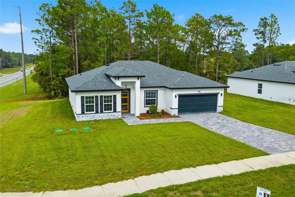 Photo of 785 Marion Oaks Trl, Ocala, FL 34473 (MLS # O6361848)