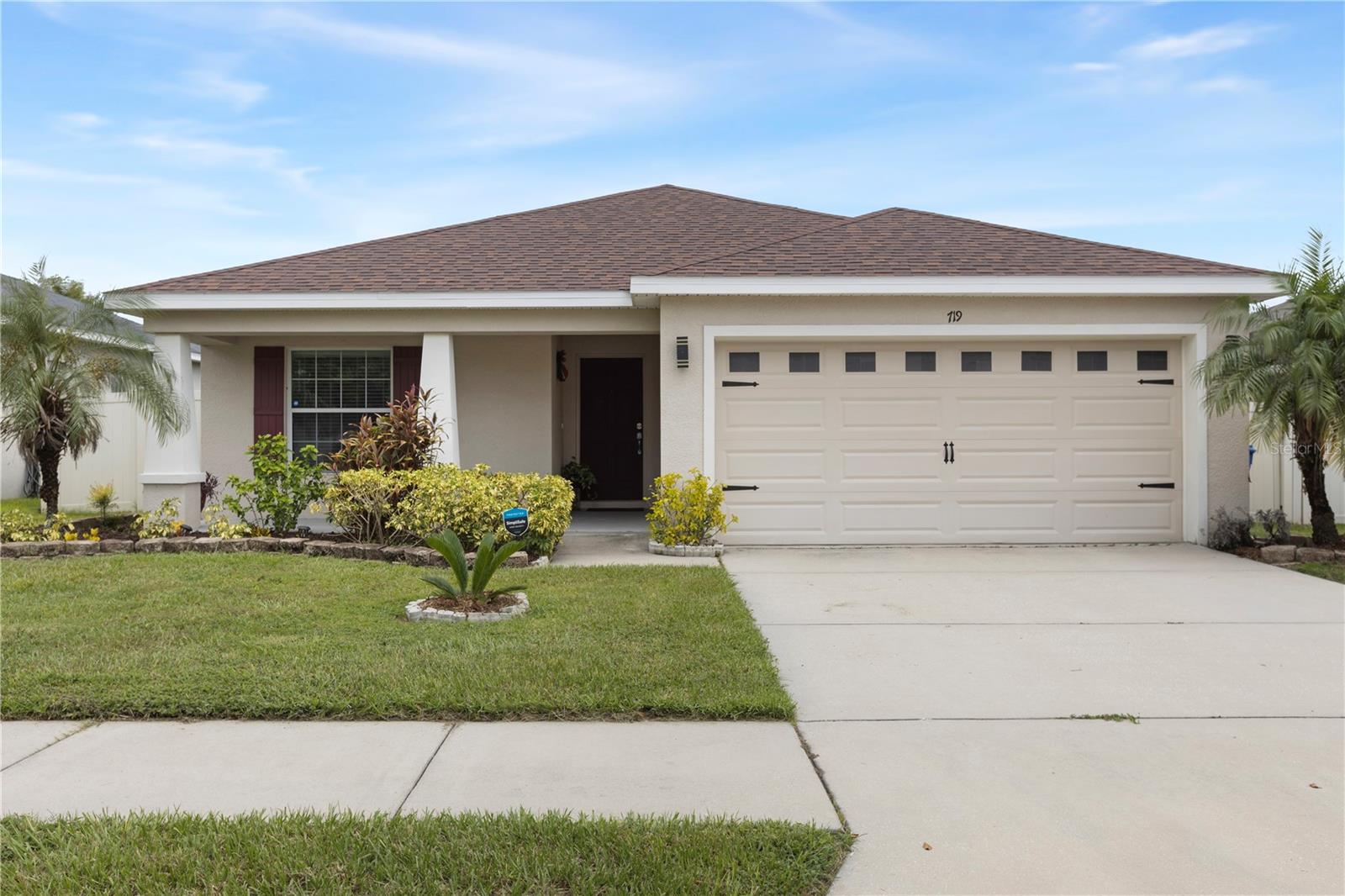 Welcome to this stunning 2018-built single-story home in the highly desirable Vineyard Reserve community. With 4 bedrooms, 2 bathrooms, and a thoughtfully designed split floor plan, this property has been refreshed and upgraded to feel brand new. As you step inside, you’re greeted by a foyer that flows into the open-concept kitchen, dining, and living area. Vaulted ceilings and abundant natural light from the windows and glass sliding doors create a bright and spacious atmosphere, perfect for everyday living and entertaining. The home has just been painted on the interior and features brand new luxury vinyl plank flooring in the main living areas, giving it a fresh, modern feel. The kitchen is the centerpiece of the home, featuring an oversized granite island with a breakfast bar, espresso cabinets, stainless steel appliances, new granite counters, and a walk-in pantry. Just off the kitchen, you’ll find the laundry room with direct access to the 2-car garage. The primary suite is a true retreat with a large walk-in closet and an en suite bathroom boasting dual sinks, a walk-in shower, a garden soaking tub, and a private water closet. Bedroom 2 sits nearby, while bedrooms 3 and 4 are accessible from the main hallway, sharing a full bathroom with a tub/shower combo. Outside, enjoy Florida living on the covered and screened lanai overlooking the fully fenced backyard, complete with a cozy outdoor fireplace and a Tuff Shed for extra storage. Conveniently located near I-4, I-75, and US-92, this home offers an easy commute to downtown Tampa and is surrounded by shopping, dining, and schools. With low HOA fees and no CDD fees, Vineyard Reserve is the perfect place to call home.