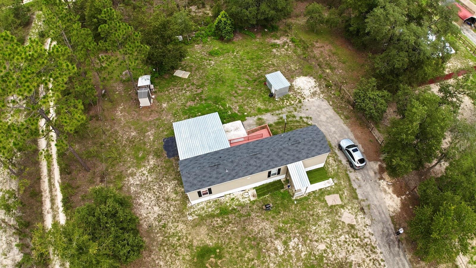 MINI-FARM - Endless Possibilities! Private 1/2 Acre. Can easily be income producing. Close to the World Equestrian Center. This high and dry property is zoned agricultural. Nestled among mature wood trees, this beautifully fenced property offers both privacy and functionality. Charming 2-bedroom, 2-bath, perfect for enjoying peaceful country living. Bring ALL your toys. Highlights include: Rainbow Springs & KP Hole Park, provides unlimited recreation. Perfect safe place for your family! Minutes to Juliette Falls Wold Class Gold Course, shopping, medical and fine dining options in historic Ocala, Gainesville & Dunnellon. Major highway access I-75, and more. So much opportunity for so little money!
