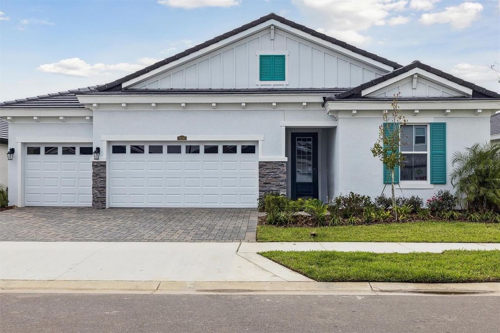Photo of 10303 Surrey Rose Drive, San Antonio, FL 33576 (MLS # TB8435278)