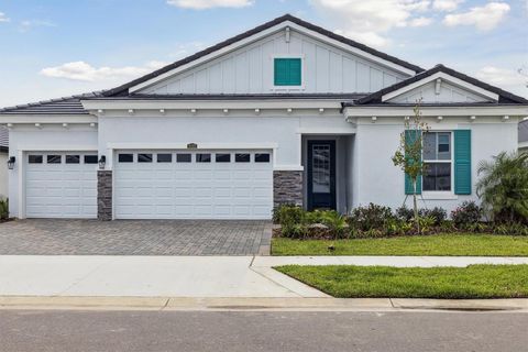 Photo of 10303 Surrey Rose Drive, San Antonio, FL 33576 (MLS # TB8435278)