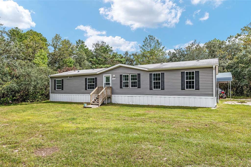 Photo of 14785 SW 71st Avenue Road, Ocala, FL 34473 (MLS # TB8538704)