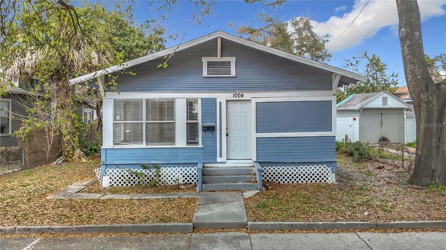 Discover the perfect blend of historic charm, modern updates, and income potential in this captivating two-story home at 1004 E 22nd Ave, Tampa, FL 33605, nestled in the desirable La Paloma section of Tampa. This versatile property offers approximately 1850 square feet of living space, featuring a main residence with 3 bedrooms and 1 bathroom—highlighted by a completely updated kitchen and bathroom for contemporary comfort—and an attached rear unit with 1 bedroom, 1 bathroom, plus a bonus room ideal for guests, extended family, or rental income. The endless possibilities make this home ideal for multigenerational living, a savvy investment, or live-and-rent setup in a thriving area.
Built with timeless appeal in the heart of historic Ybor City vibes, the property provides peace of mind through recent upgrades: a 2020 roof, 2016 AC, and 2015 water heater. Enjoy low-maintenance living while capitalizing on the location's convenience and character.
Just steps from the vibrant energy of Ybor City, residents are immersed in Tampa's rich cultural heritage, with iconic attractions like the historic Columbia Restaurant (Florida's oldest), J.C. Newman Cigar Factory tours, lively 7th Avenue (La Séptima) strolls lined with shops, cafés such as La Segunda Bakery for authentic Cuban bread, and nightlife spots. Close proximity to the free TECO Line Streetcar that connects you effortlessly to downtown Tampa, only a short ride away, where you can explore the Riverwalk, Florida Aquarium, Tampa Bay History Center, and more.
Within a quick drive (under 10-15 miles), thrill-seekers reach Busch Gardens Tampa Bay for world-class rides and animal encounters, while families enjoy ZooTampa at Lowry Park. Tampa International Airport is easily accessible for travel, and beautiful Gulf beaches like those in Clearwater or St. Pete are within about 20-30 minutes. Proximity to major destinations, combined with the neighborhood's historic charm and investment potential, makes this home a rare gem in Tampa's dynamic real estate market. Don't miss the opportunity to own a piece of Tampa's story!