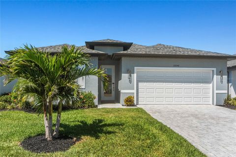 Photo of 16848 Cayo Key Drive, Port Charlotte, FL 33953 (MLS # N6137721) Photo of 16848 Cayo Key Drive, Port Charlotte, FL 33953 (MLS # N6137721)