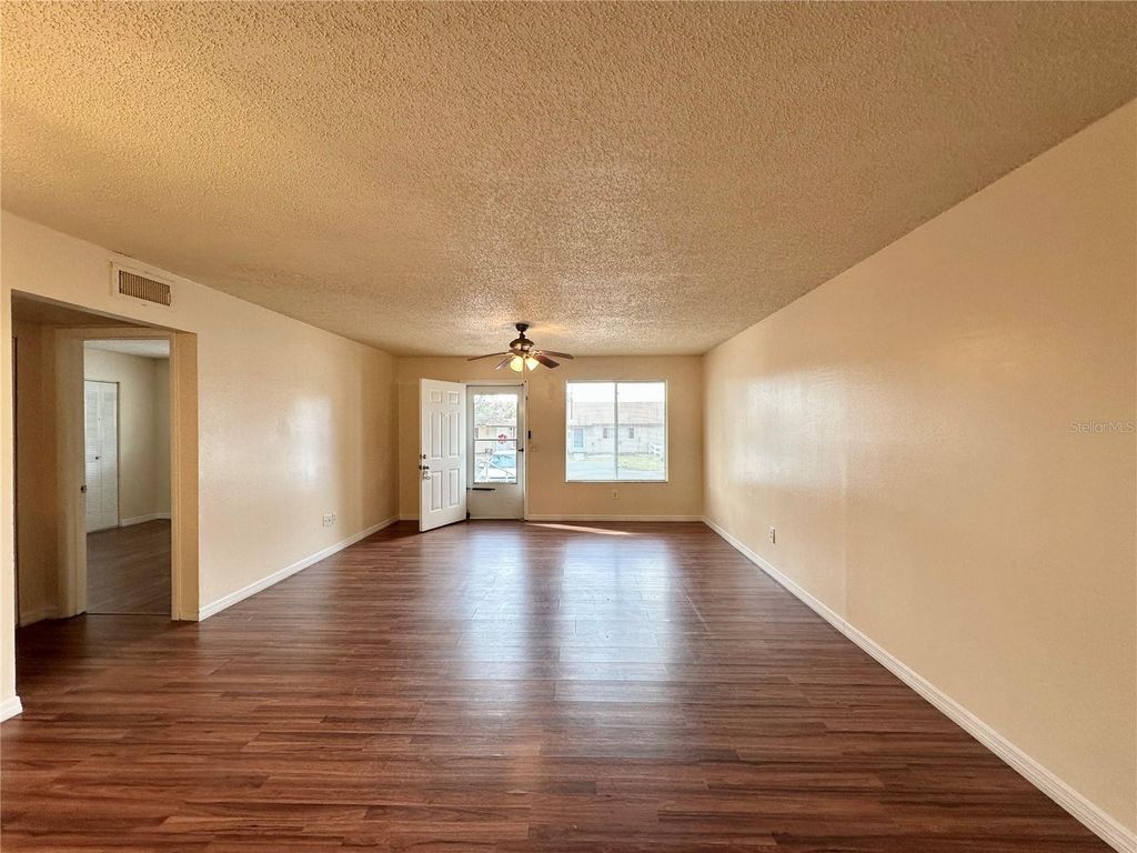 Photo of 343 E Rosewood Lane #343, Tavares, FL 32778 (MLS # OM715319)