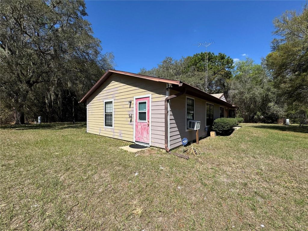 Photo of 10962 SW 112th Avenue, Dunnellon, FL 34432 (MLS # OM720517)