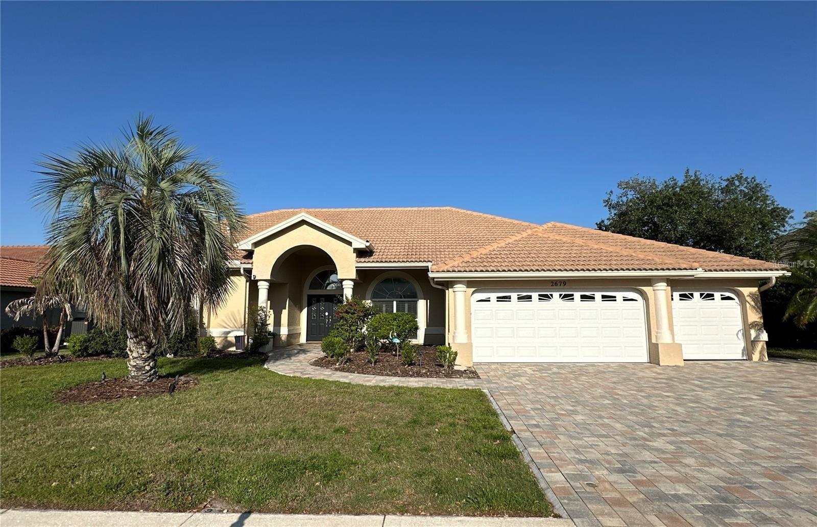 Welcome to your next home in highly sought-after East Lake / Palm Harbor! This beautifully updated 4-bedroom, 3-bath pool home offers over 2,700 square feet of bright, open living space with soaring ceilings, luxury finishes, and serene lake views — the perfect blend of comfort, space, and style. Step through the modern entryway into an inviting open floorplan designed for both everyday living and entertaining. The spacious kitchen features custom cabinetry, plenty of counter space, and flows seamlessly into the main living area. The primary suite includes direct access to the pool deck and offers peaceful views of the water — a true retreat. Out back, unwind in your screened-in pool and spa, complete with travertine pavers and a relaxing waterfall effect. With no rear neighbors and tranquil lakefront views, you'll enjoy privacy and serenity from your own backyard oasis. Additional features include a 3-car garage, Split-bedroom floor plan, Luxury flooring throughout, New A/C system (2023), and Washer/dryer included. Located just minutes from John Chesnut Park, Publix, Starbucks, and Lake Tarpon, with easy access to top-rated schools, shopping, dining, and outdoor recreation. Don't miss this rare opportunity to lease a home that feels like a private resort in one of Pinellas County’s most desirable neighborhoods. Available now — schedule your private showing today!