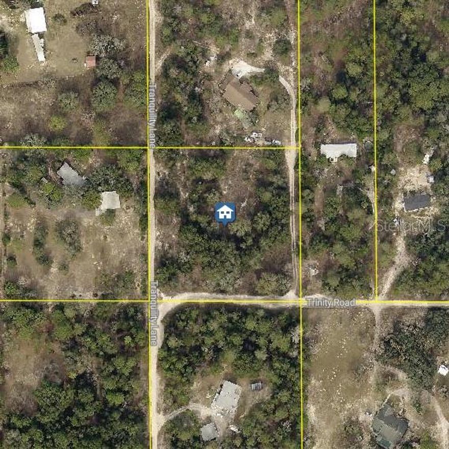 BOUTIQUE FARM, BARNDOMINIUM, OR SECLUDED COUNTRY HIDEAWAY!
 Rare opportunity to own 2.5 beautiful acres on Trinity Rd in desirable Brooksville! Enjoy the peace, privacy, and country atmosphere while still being conveniently located near major roadways, medical facilities, shopping, dining, and entertainment. Just minutes from HCA Florida Oak Hill Hospital, Sam’s Club, Home Depot / Lowes,  BJ’s, Publix, and popular dining spots like Florida Cracker Kitchen and Texas Roadhouse. Enjoy nearby entertainment and outdoor recreation including Weeki Wachee Springs State Park, local golf courses, and shopping centers, all within a short drive. Whether you're dreaming of a custom home, mini farm, barndominium, or private weekend retreat, this property offers endless potential with the perfect balance of seclusion and convenience. Amazing value for acreage in a amazing area — priced to sell!