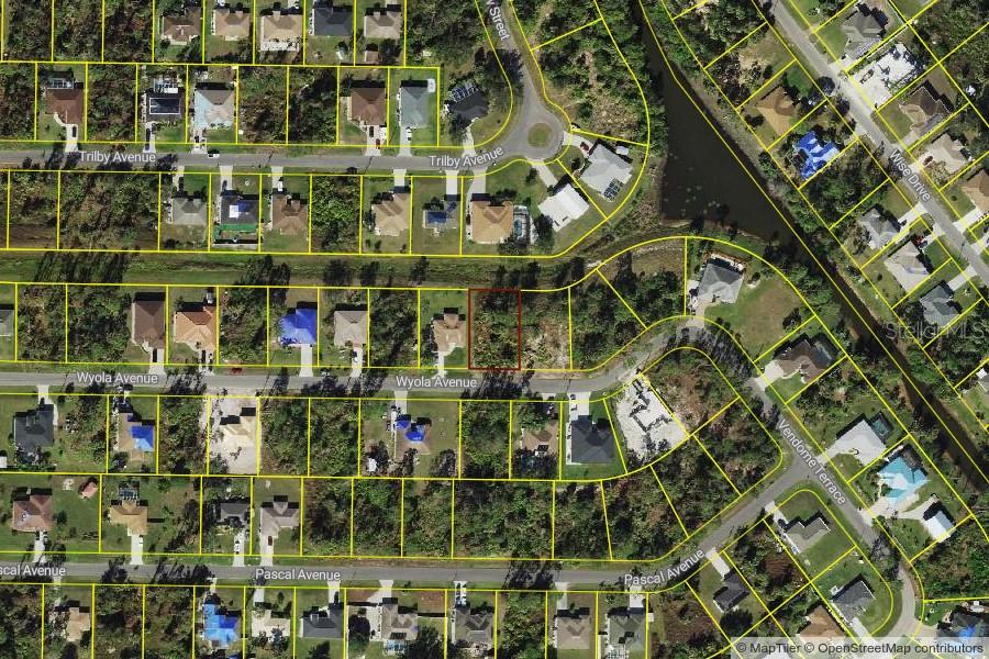 Beautiful lot waiting for you to build your dream home in the thriving city of North Port, home of the Atlanta Braves Spring Training. This property is on a 50' greenbelt providing plenty of privacy for your backyard! Minutes to the North Port Aquatic Center, the water park that features a 25-meter stretch pool, three slides, and a lazy river. Centrally located to EVERYTHING...US-41, I-75, schools, Suncoast Technical College, Shannon Staub Library, and plenty of grocery & retail shopping, and dining. Close to Venice, Port Charlotte & Punta Gorda. Near the new waterfront oasis, Sunseeker Resorts. Convenient access to a multitude of golf courses, world-class fishing, boating, and stunning Gulf beaches!