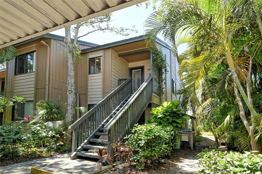 Well maintained and tastefully furnished 2nd floor end unit. Brazilian mahogany floors throughout as well as a newer heating/cooling system and a 3-year old hot water tank. A touch of elegance is added by the glass front entry door which contributes generously to the amount of daylight entering this part of the unit. There are quartz countertops throughout. Adding to the convenience are cabinets with self-closing drawers and doors. The appeal of the unit is further enhanced by a 1 year old sofa and loveseat. The walk-in closet has been outfitted with shelving and affords ample storage space. Adjoining the closet is a fully tiled bathroom sporting a brand-new faucet. This unit is designed to satisfy your needs for the foreseeable future. Pelican Cove is a gated pet friendly condominium community abounding with amenities, including a low-cost 86-slip boat harbor, kayak and canoe launch, six heated swimming pools, hot-tub, three clubhouses, classrooms, gym, art, woodworking and pottery studios, four lit tennis/pickleball courts, shuffleboard, basketball, dog play area, walking trails, boardwalks and fishing gazebos. Take classes at Pelican Cove University, yoga, tai-chi, water aerobics, painting or photography. More than 37 clubs for arts, cycling, culinary arts, bridge, film and more. Relax at the evening jazz & classical music concerts, enjoy a stroll around 78 acres of lush grounds. Pelican Cove is hidden away yet minutes from everything! Come see for yourself! This is the lifestyle you deserve!