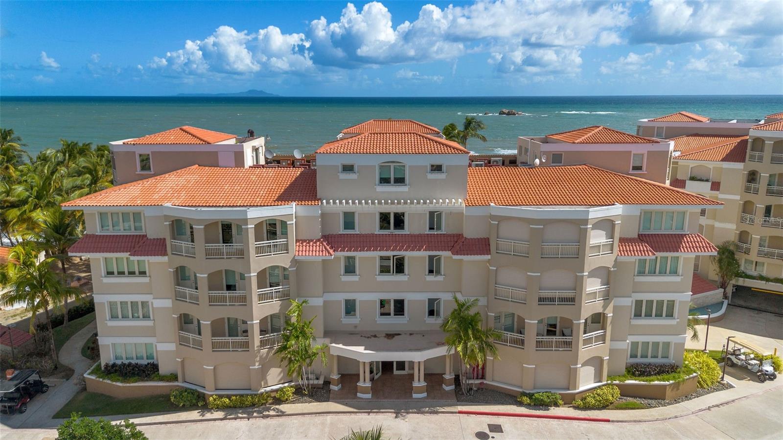 Seaside Paradise at Plaza del Mar, Palmas del Mar
Experience the ultimate in beachfront living with this exceptional third-floor condo at Plaza del Mar, located within the sought-after Palmas del Mar resort. Perfectly positioned right on the beach, this home offers uninterrupted ocean views and an unparalleled connection to the sand and sea. Combining elegance and coastal comfort, the entire unit is conveniently laid out on one level.
This condo boasts a spacious open design, ideal for living and entertaining. It features 4 large bedrooms, including an impressive primary suite, and 3.5 beautifully appointed bathrooms. Step out onto three private balconies to take in the breathtaking views of the ocean and marina—each one a serene retreat to enjoy the tropical breeze and sounds of the waves.
Additional highlights include two underground parking spaces and ample visitor parking for your guests' convenience. The building offers outstanding amenities such as a heated swimming pool, two elevators per tower, and dual backup generators for added security and comfort.
Living in Palmas del Mar means living in paradise. This gated and secure community provides pristine beaches, two golf courses, a tennis and pickleball club, an equestrian center, and The Palmas Academy, a highly regarded school. Add to that gourmet dining, vibrant entertainment, and miles of trails for walking, jogging, or golf cart cruising. Whether enjoying the vibrant marina or relaxing on your beachfront balcony, Palmas del Mar delivers a lifestyle that blends luxury, tranquility, and unmatched convenience.
Schedule your visit today to make this rare beachfront condo at Plaza del Mar your new home. Experience the best of Puerto Rico’s coastal living in the heart of Palmas del Mar.