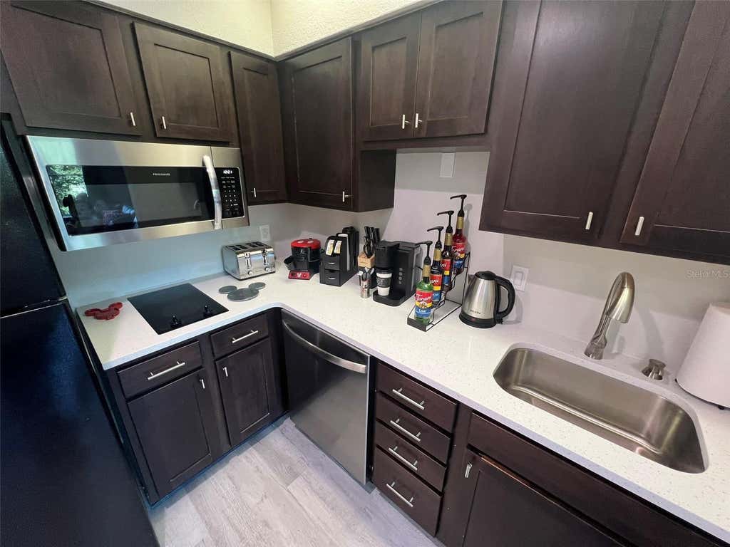 Photo of 8303 Palm Parkway #404, Orlando, FL 32836 (MLS # TB8536846)