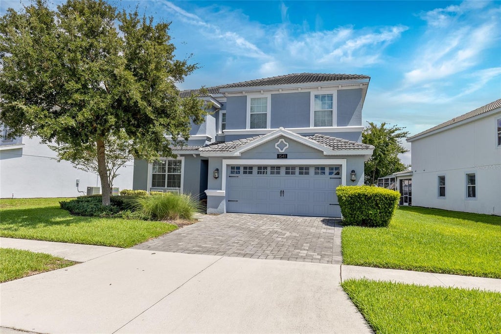 Photo of 1541 Mulligan Boulevard, Davenport, FL 33896 (MLS # O6437601)
