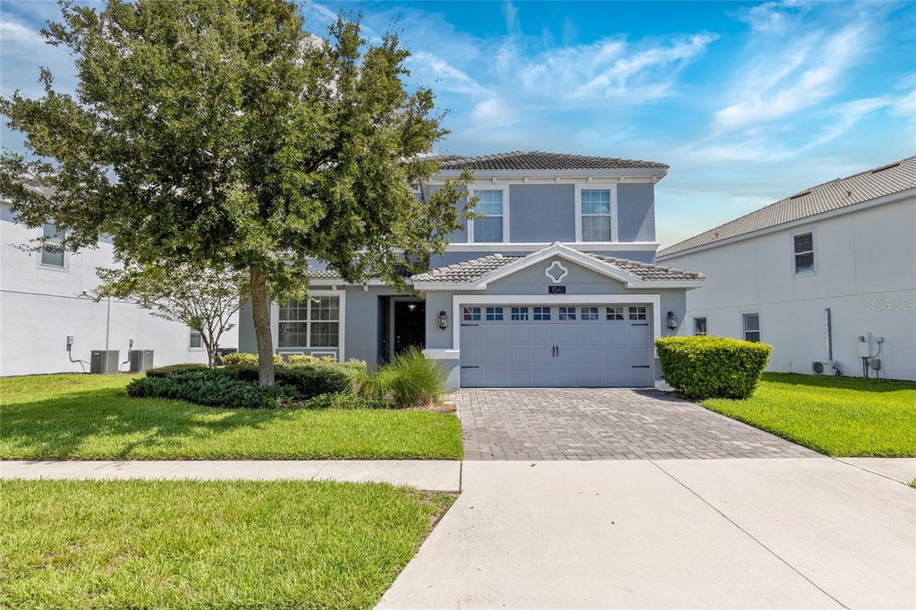 Photo of 1541 Mulligan Boulevard, Davenport, FL 33896 (MLS # O6437601)