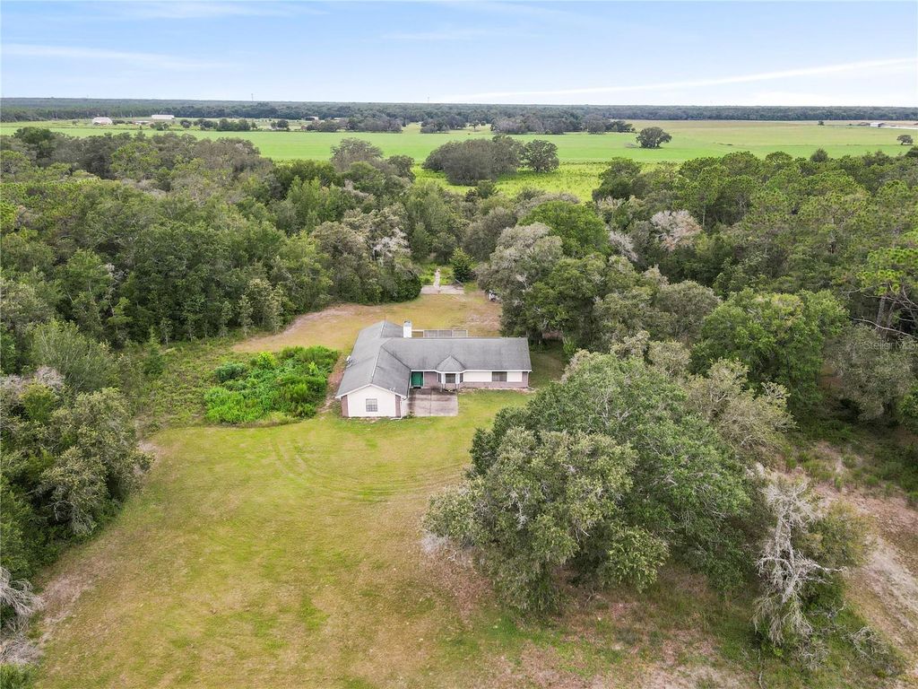 Photo of 18321 Mcmullen Rd, Spring Hill, FL 34610 (MLS # TB8417702)