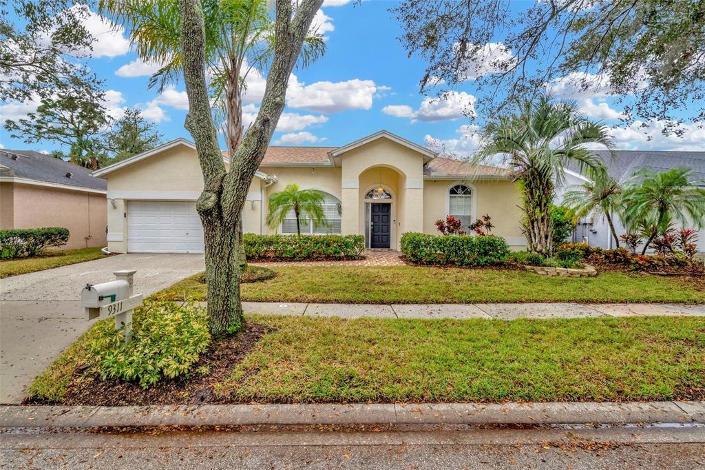 Photo of 9311 Hampshire Park Drive, Tampa, FL 33647 (MLS # TB8340680)