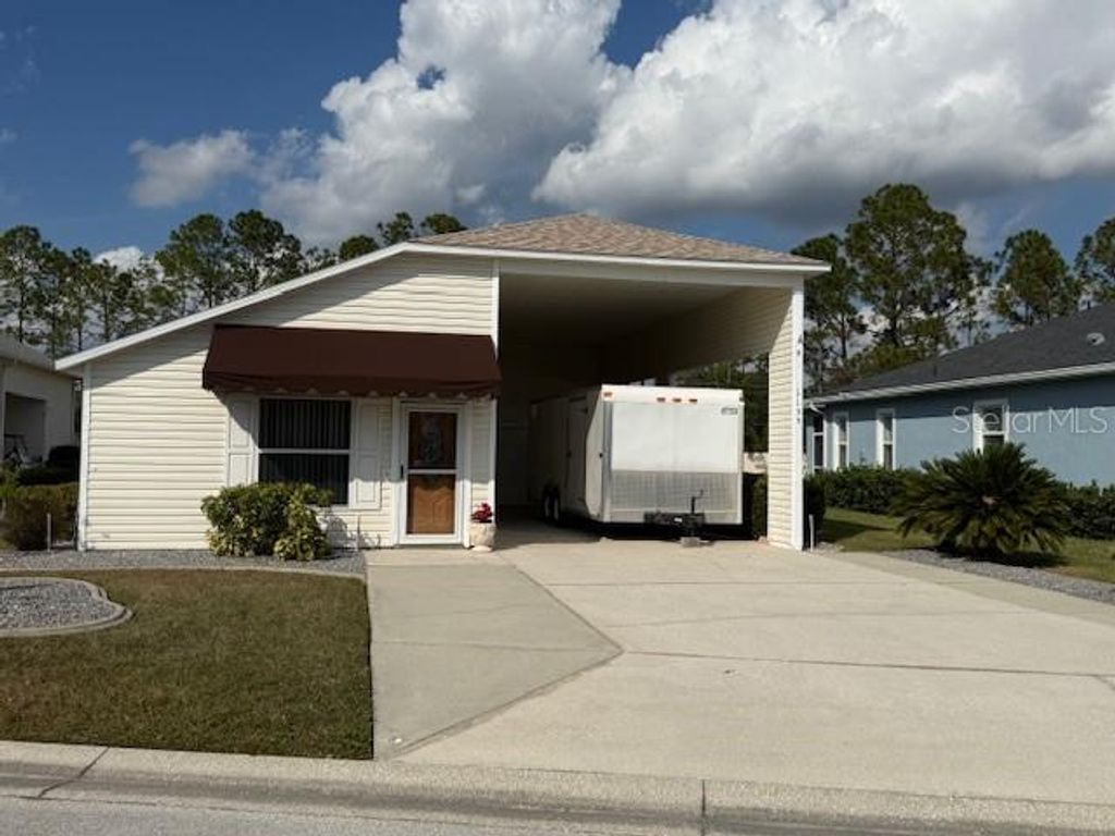 Photo of 1155 Motorcoach Drive, Polk City, FL 33868 (MLS # L4951114)