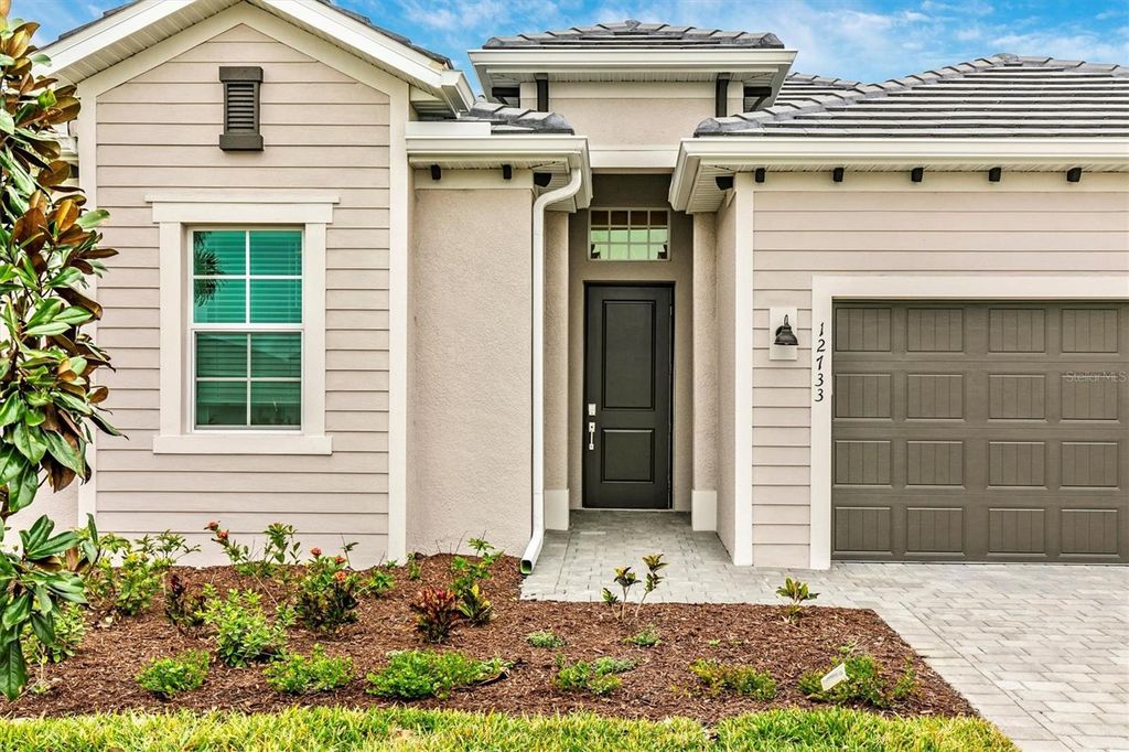 Photo of 12733 Tulum Loop, Venice, FL 34293 (MLS # N6143528)