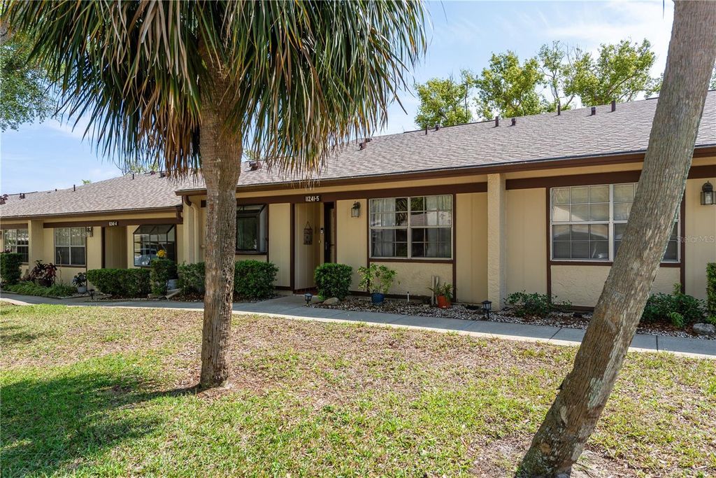 Photo of 11241 Dollar Lake Drive #5, Port Richey, FL 34668 (MLS # W7874936)