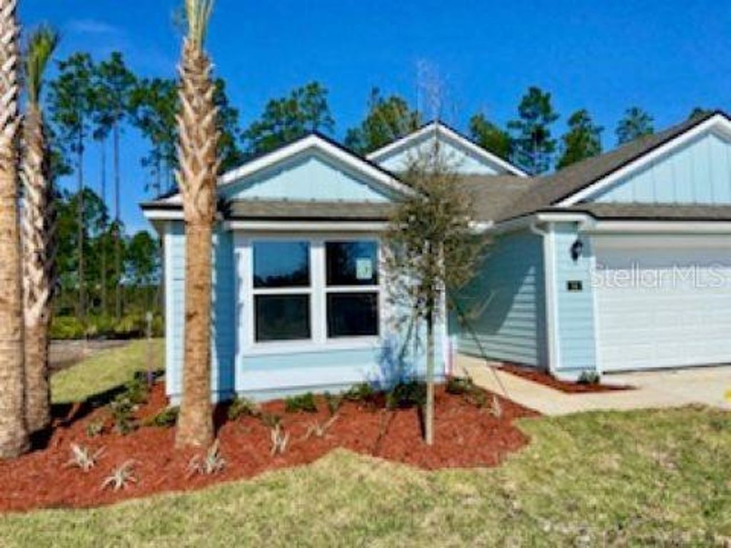 Photo of 14 Lumber Jack Trail, Palm Coast, FL 32137 (MLS # FC299251)