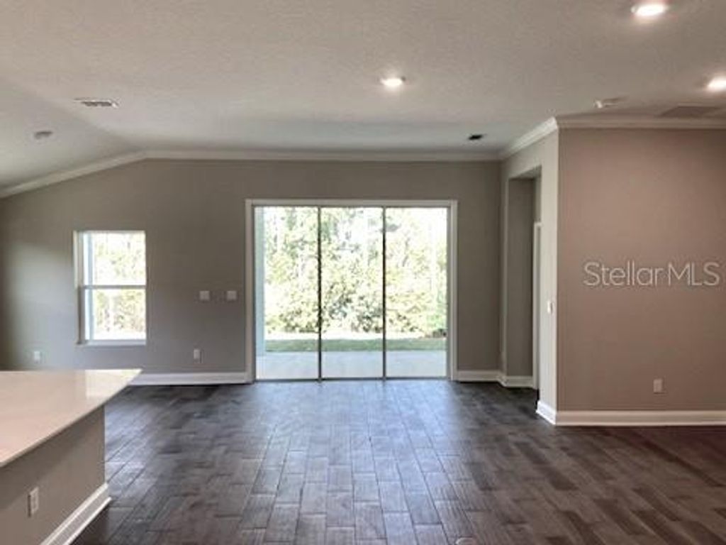Photo of 14 Lumber Jack Trail, Palm Coast, FL 32137 (MLS # FC299251)