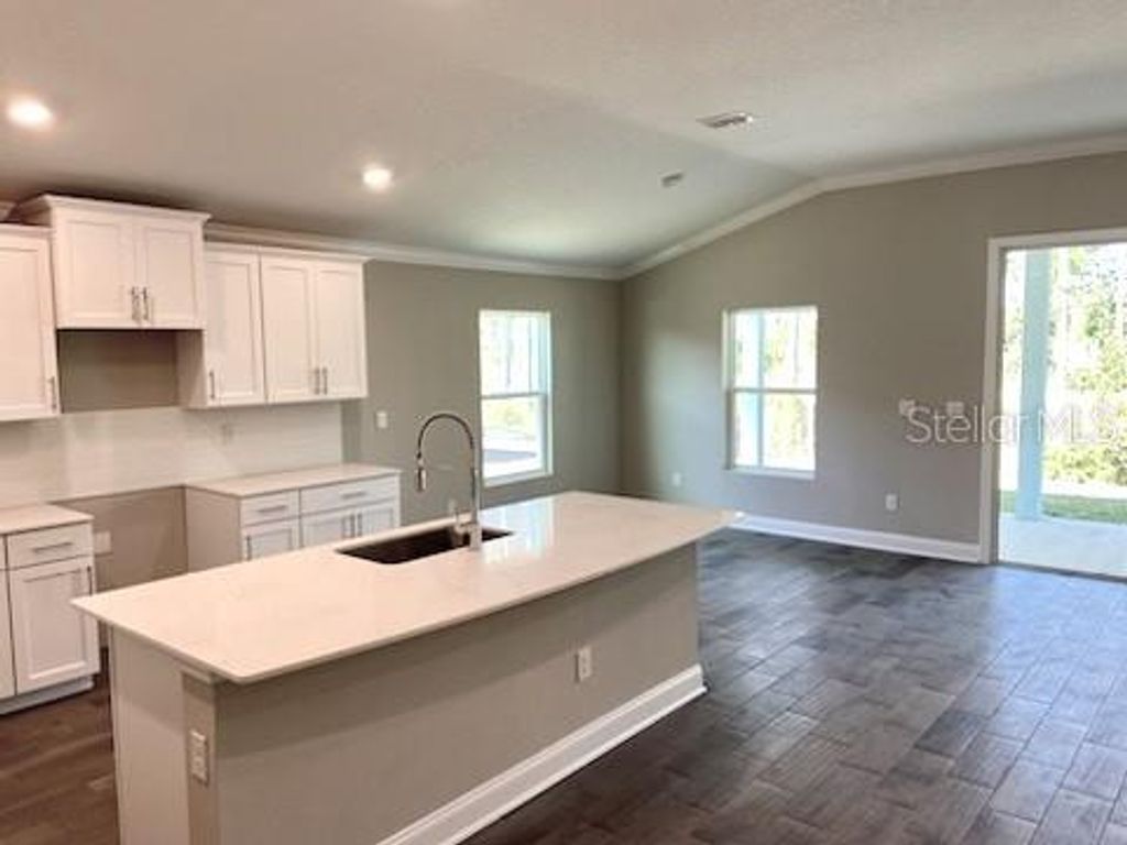 Photo of 14 Lumber Jack Trail, Palm Coast, FL 32137 (MLS # FC299251)