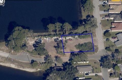 Photo of 402 Ronnie Circle, Orlando, FL 32811 (MLS # O6445368)