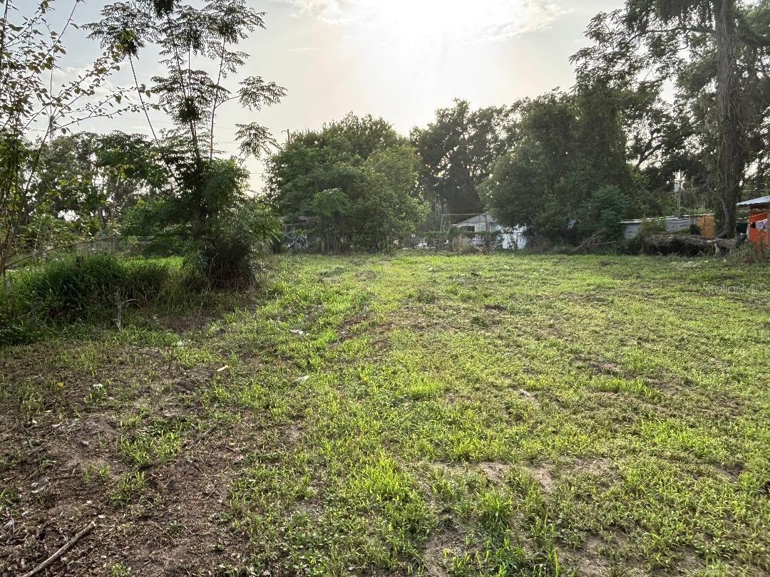 Located in the heart of Dade City, this 0.17-acre residential corner lot offers the perfect setting to build your dream home. With no HOA, you’ll enjoy the freedom to design and construct without the restrictions or fees of a homeowners association. Zoned for residential use, the lot is ideal for either a custom-built home or a manufactured home, giving you flexible options to suit your needs. The property is conveniently situated close to shopping centers, restaurants, retail stores, and other everyday amenities, making it an excellent choice for both comfort and convenience. With great accessibility and a prime location, this lot presents an outstanding opportunity to create the home you’ve always envisioned.