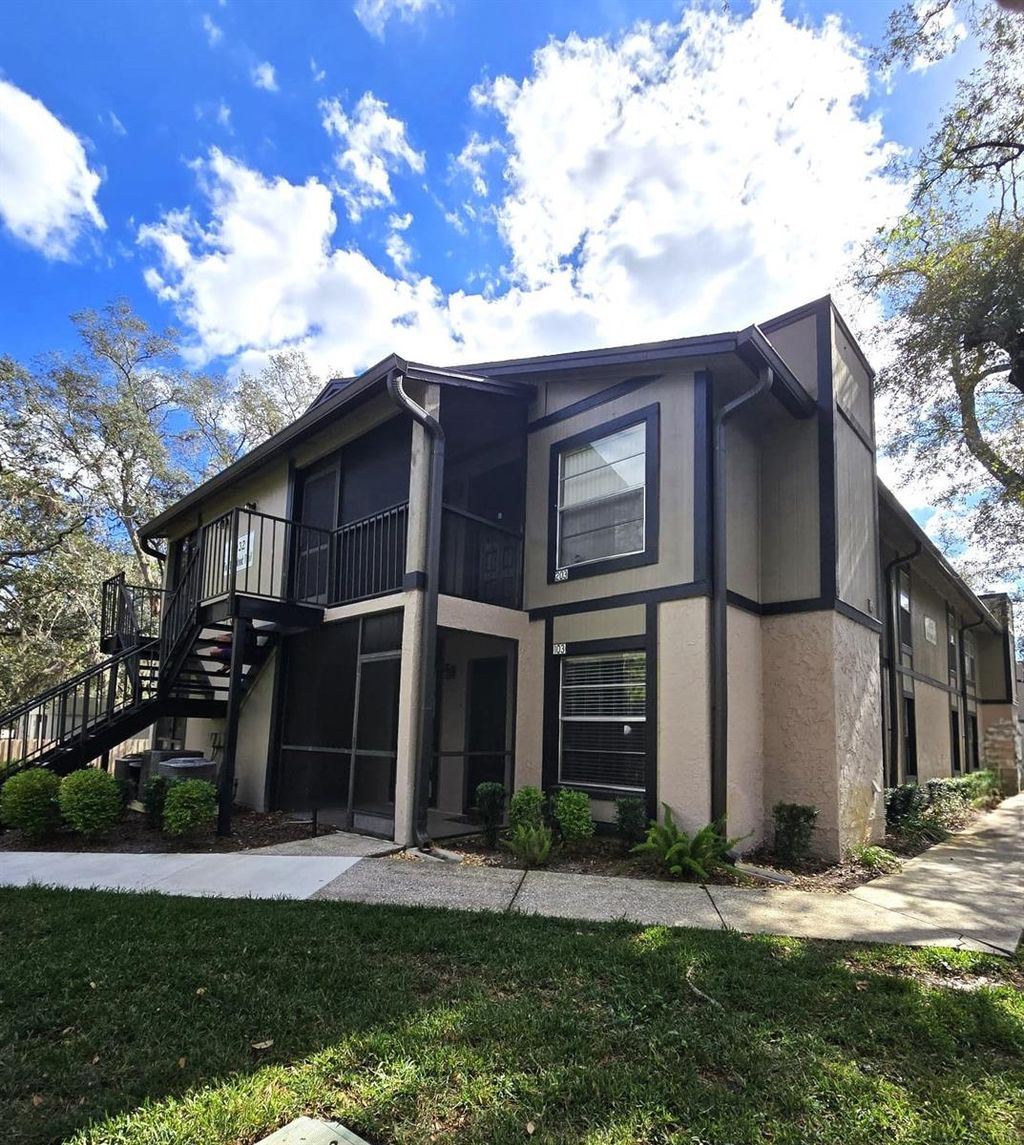 Photo of 4032 Tumble Wood Trail #103, Tampa, FL 33613 (MLS # TB8502356)