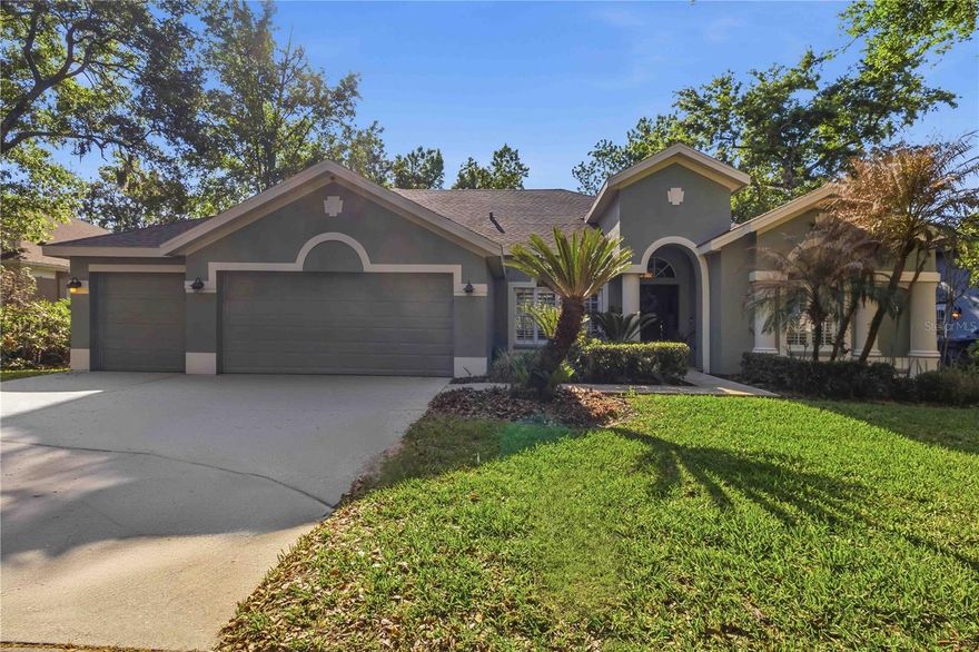 Large lot, desirable view, beautifully updated, and listed below appraised value! This 4 bedroom, 3 bathroom home features a triple split floor plan leaving plenty of room for work and play. A travertine walkway guides you from the three-car driveway through the front door. To the right is a home office/flex space that is accessible from the primary suite and to the left is the formal dining room with updated contemporary lighting. Straight ahead and through the formal living area is a peek of the pond and pavered free-form saltwater swimming pool with spa. The primary bedroom completes the entire right side of the home with custom paint and dual owner closets. An en-suite primary bath lends a feeling of spaciousness with the meticulous use of tile and seamless glass. The oversized zero entry shower lies across from a claw foot tub and dual sinks with upgraded furniture-style cabinetry sit between an open shelf storage area and water closet customized with carefully selected wallpaper to complement the entire bathroom. Back in the primary living areas, wood look tile set in a herringbone pattern leads you into the rest of the home. Immediate through the dining room is a short hallway, passing the laundry room (washer and dryer convey) and a command center for the home - perfect for completing homework or organizing tasks. Two secondary bedrooms and a second updated bathroom lay just beyond the stairs to the second floor bonus room, which overlooks the backyard, pond, and treeline. Back downstairs is the efficiently laid out kitchen with 42" upper cabinets, stainless steel appliances, breakfast bar, breakfast nook, and two pantries offering ample storage space. The kitchen and breakfast area open to a spacious gathering room with a gas fireplace and built-in cabinetry. Through the family room and set apart for privacy is another bedroom and a bath that doubles as a pool bath due to location near the backdoor.  This backyard space was designed for relaxation, play, entertaining, or all three! With 80 feet of pond frontage and even more expansive views, the open travertine patio is a perfect place to rest at the start of the day. Landscaping is gradually coming back to life after a freeze and soon the shrubs and flowers will be blooming to add to the tapestry of texture and color. The screened lanai features a pool area with generous decking space and a spa pre-plumbed for a gas heater.  Key updates include: Roof 2021, A/C 2017, Water Heater 2019, Water Softener 2019, Exterior Paint 2026. Home is currently zoned for Bevis Elementary School, Randall Middle School, and Newsome High School.
This home is move-in ready and waiting for its next chapter. Arrange your showing today!