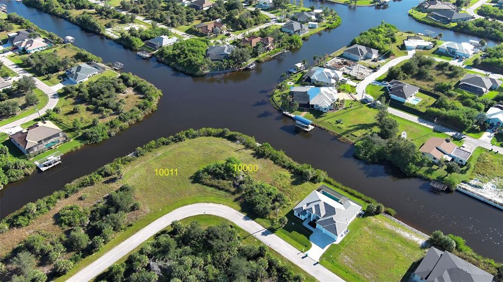 Photo of 10000 Long Beach Street, Port Charlotte, FL 33981 (MLS # C7515546)