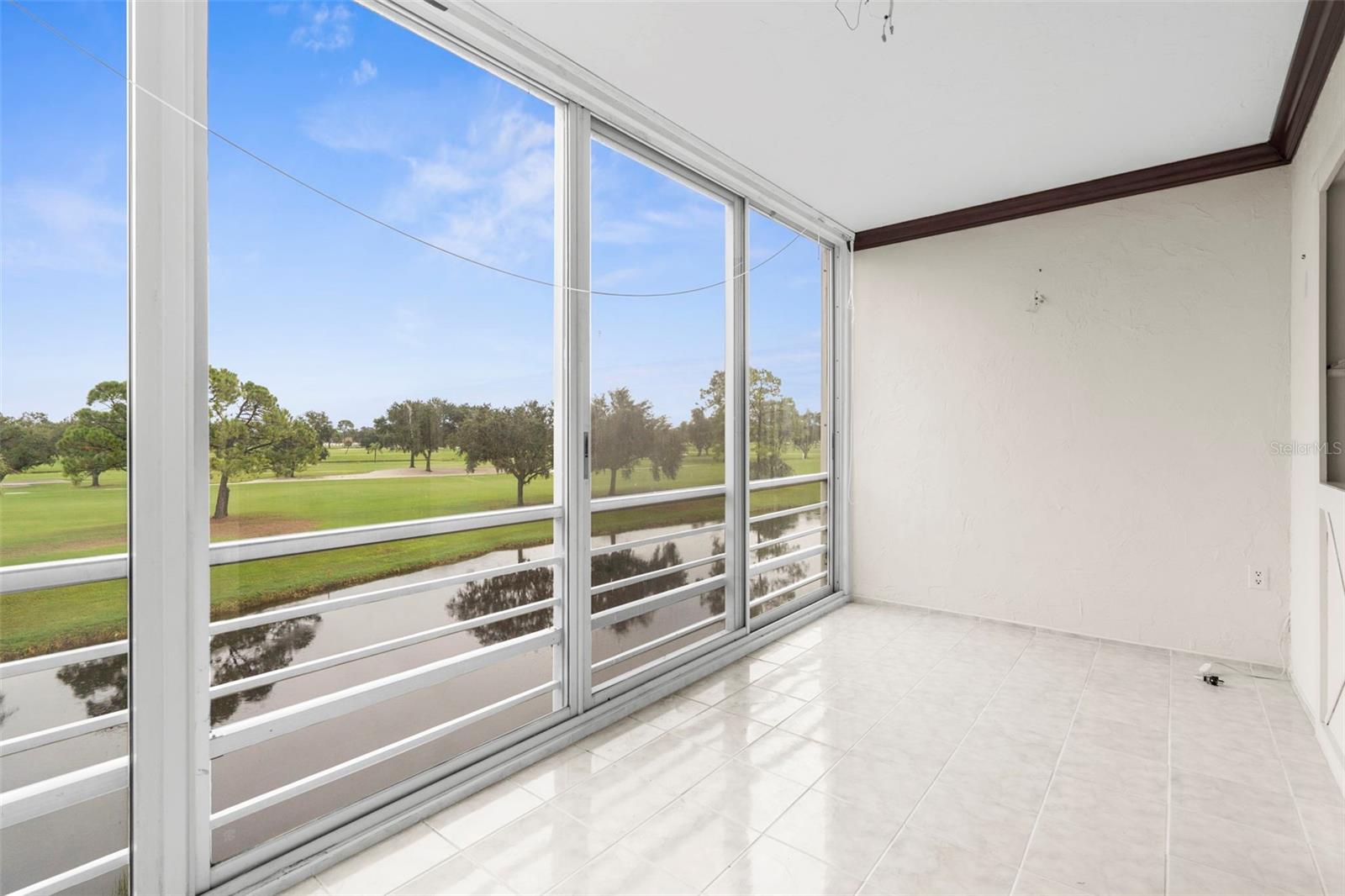 Location, location, location! Welcome to this spacious 3-bedroom, 2-bath condo with a direct view overlooking the golf course. This 3rd floor corner unit home offers an open layout, screened lanai, and primary suite with walk-in closet and en-suite bath. Enjoy the privacy of a corner location with easy access to the community pool and clubhouse. Elevator access is available to the unit. This condo is a blank slate with tremendous opportunity to own in a maintenance free community conveniently located near shopping, dining, and entertainment. Palm Aire Country Club memberships are optional. This club includes 2 golf courses, tennis courts, pickleball courts, fitness center and a clubhouse with many events. Book your private showing today!