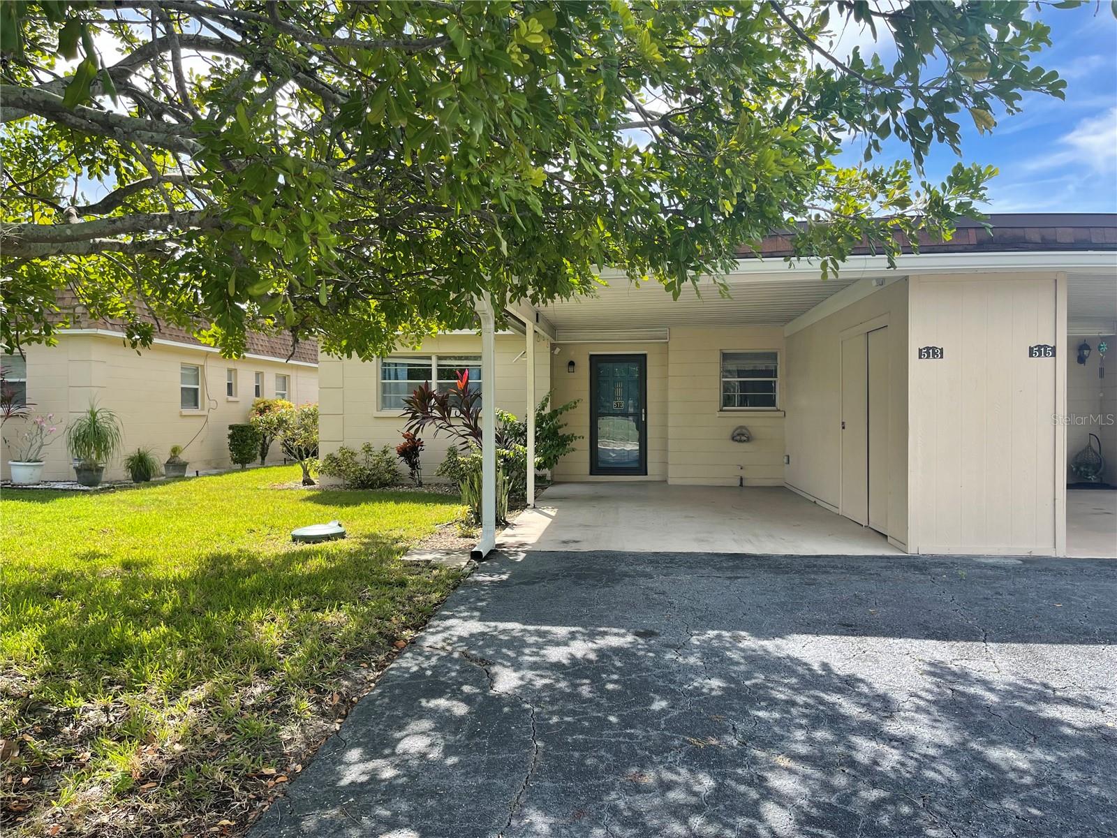 Furnished 2 bedroom 2 bath Villa in the active 55+ community of Park Acres Estates. The community features a clubhouse with activities year round, a heated pool and shuffleboard courts. The villa features a covered carport with additional locked storage for beach items and bikes. Inside you'll find a freshly updated kitchen with new cabinet doors and a pass through to the dining/living rooms combo. The primary bedroom includes a walk in closet and en-suite bath with tiled shower. Guest bedroom is located in the front of the villa and next to the guest bath with a tub/shower. At the rear of the villa is an insulated and enclosed Florida room with access to the backyard and a laundry closet with full sized washer and dryer. The villa has had an electrical update with new service, a smart camera system with 4 cameras, Nest thermostat, 2 smart TVs, smart wall switches and an on demand hot water system. Conveniently located close to restaurants and shopping with easy access to SRQ airport, Downtown Bradenton, Riverwalk, Village of the Arts and the beautiful sandy beaches of Anna Maria Island.