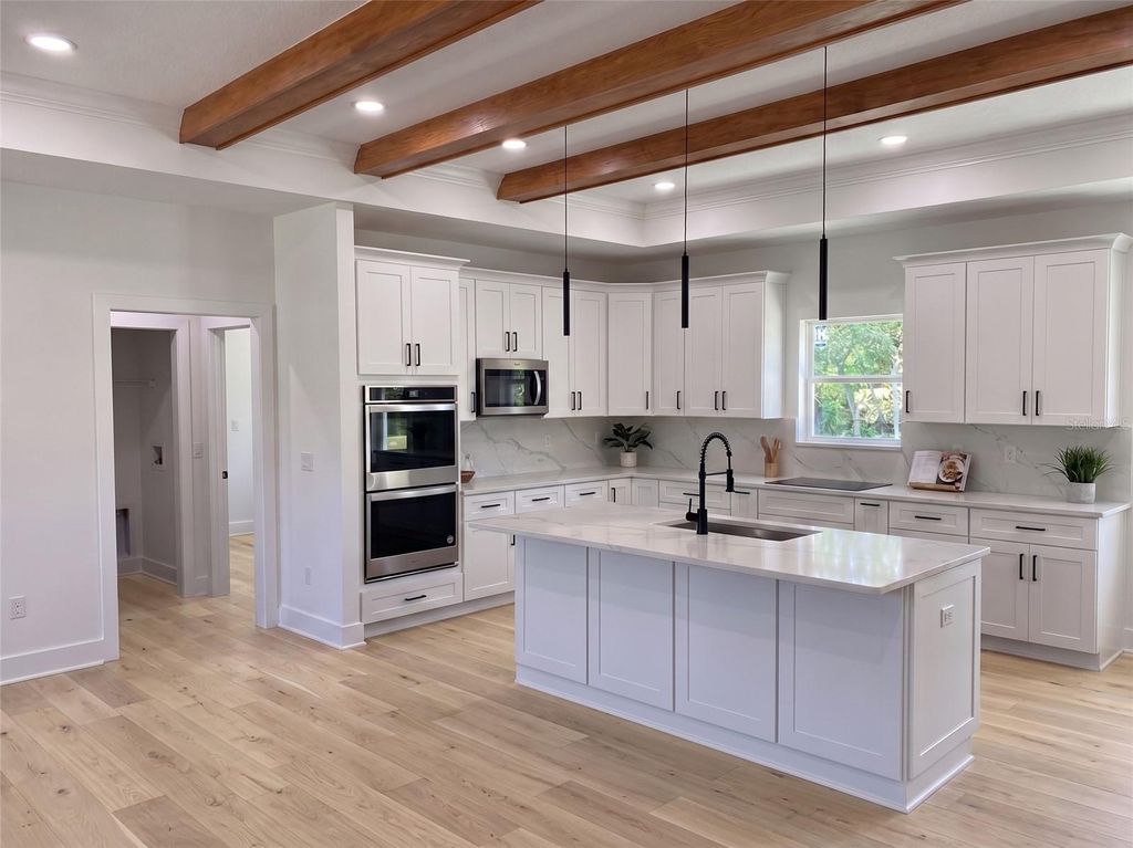 Photo of 35425 Nutmeg Drive, Webster, FL 33597 (MLS # TB8511001)