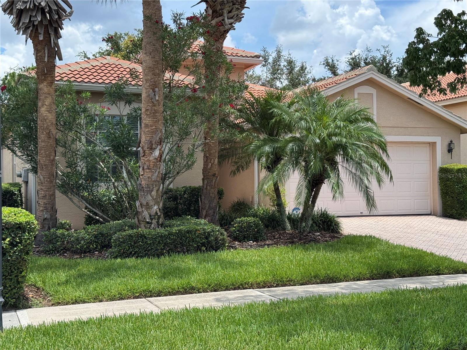 THIS HOME IS A GREAT BUY & READY FOR YOU IN THE GATED PREMIER 55+ NEIGHBORHOOD OF VALENCIA LAKES! FRESHLY PAINTED INTERIOR SO YOU CAN MOVE RIGHT IN TO THIS 2 BEDROOM/2 BATH HOME PLUS DEN WITH DOUBLE FRENCH DOOR ENTRY. OPEN KITCHEN HAS BREAKFAST BAR, GRANITE COUNTERTOPS, LIGHT 42" CABINETS & DINETTE NOOK. CROWN MOULDING IN EVERY ROOM & CERAMIC TILE THROUGHOUT THE WHOLE HOUSE. WATER SOFTENER SYSTEM. A/C WITH UV LIGHT. RETRACTABLE SCREEN ON FRONT DOOR. HURRICANE SHUTTERS. NO FLOOD ZONE. RELAX & ENJOY THE LARGE SCREENED, COVERED PATIO WITH GARDEN VIEW. TWO CAR GARAGE. INCLUDED WITH THE HOME IS A VERY ACTIVE COMMUNITY OFFERING RESIDENTS THE FLORIDA LIFESTYLE YOU WANT WITH A BEAUTIFUL CLUB HOUSING A SOCIAL HALL PRESENTING ENTERTAINMENT & SPECIAL EVENTS; CARD & GAME ROOMS; CRAFTS ROOM; BILLIARDS; TENNIS; PICKLEBALL; BOCCE BALL; SOFTBALL FIELD; COMMUNITY GARDEN, DOG PARK & SO MUCH MORE! STATE-OF-THE-ART EXERCISE FACILITY WITH PERSONAL TRAINER AVAILABLE. THERE IS NO LACK OF THINGS TO DO IN VALENCIA LAKES, WITH MANY GROUPS TO JOIN & EXERCISE CLASSES TO CHOOSE FROM. COOL OFF IN THE BEAUTIFUL LAP OR RESORT STYLE POOLS OR ENJOY THE WARMTH OF THE RESISTANCE POOL & HOT TUB. IN ADDITION TO THE MANY AMENITIES, THE HOA FEE ALSO COVERS LANDSCAPING, HOME SECURITY MONITORING, ON SITE MANAGEMENT, CABLE & INTERNET. PETS & GOLF CARTS WELCOME. TWO MILE PATH CIRCLING AROUND THE LUSHLY LANDSCAPED NEIGHBORHOOD ALLOWS FOR EXERCISE & BIKING. PERFECTLY LOCATED IN PROXIMITY TO DOWNTOWN TAMPA, SARASOTA, BEACHES & MANY FLORIDA ATTRACTIONS. SEEKING OFFERS, THIS HOME IS PRICED FOR A QUICK SALE. CALL NOW FOR YOUR PERSONAL TOUR.