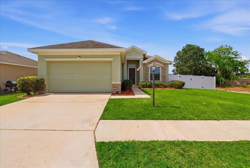 Located in the desirable James Town Place community in Bartow, this beautifully maintained 3-bedroom, 2-bath home also features a dedicated office that could easily serve as a 4th bedroom. Designed with a split, open floor plan, the home offers high ceilings and recessed lighting, creating a bright and inviting atmosphere throughout.
The kitchen showcases stainless steel appliances, warm wood cabinetry, a center island with a breakfast bar, and a closet pantry. It flows seamlessly into a spacious breakfast room and a separate formal dining room that could also serve as a living room—offering convenience and flexibility, perfect for both everyday living and entertaining.
The primary suite is generously sized and features an en suite bath with a dual-sink vanity, garden tub, and large walk-in shower. Two additional oversized bedrooms, each with walk-in closets, share a conveniently located guest bath, providing comfort and space for family or guests.
Step outside to enjoy the large screened lanai overlooking a fully fenced backyard. The backyard also includes a handy storage shed, and a 10-foot double gate on the side provides easy access—perfect for a boat, trailer, or other outdoor equipment. Exterior soffit lighting enhances the home’s curb appeal, and architectural shingles add both durability and style.
Additional features include a 2-car garage with an oversized garage door and ample storage space.
Jamestown Place offers a friendly neighborhood with sidewalks and a playground, while being conveniently located near shopping, dining, and everyday amenities. With easy access to Highway 17 and the Polk Parkway, commuting is a breeze. Low HOA fees add to the home’s overall appeal.