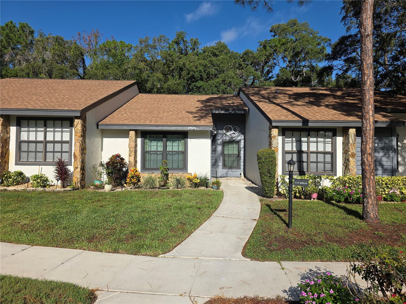 Timber Pines 1 Bedroom 1 Bath Villa- Tiled Eat In Kitchen With A Dining Nook And Pantry- Enclosed Porch With A Storage Closet And Laundry Area- Out Back There Is A Wood Deck- Open Floor Plan-- Call Today For A Showing. Timber Pines, a 55+ Gated Community, With 4 Golf Courses, Country Club, Remodeled Restaurant And Bar With Multiple TV Screens, 2 Pools, Fitness Center, Tennis And Pickle Ball Courts, Bocce Ball, Billiards Room And More Than 100 Different Clubs. Spectrum Cable, 2 boxes and High-Speed Internet Are Also Included In the HOA.