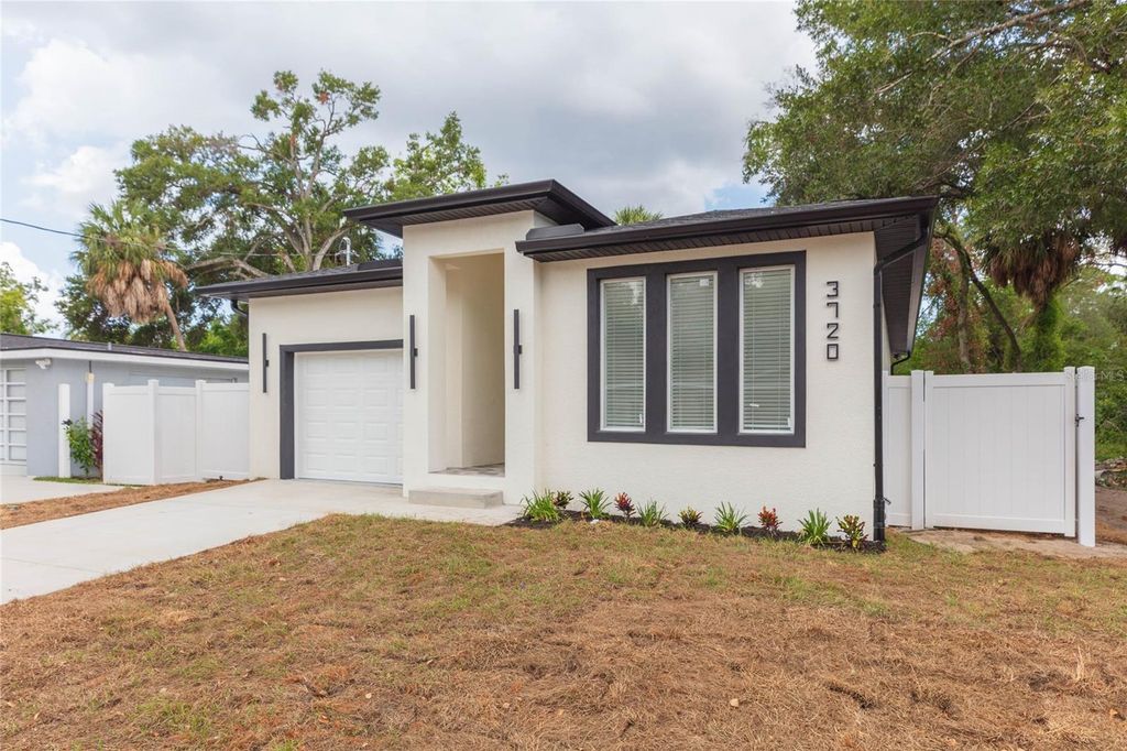 Photo of 3720 N 32nd St, Tampa, FL 33610 (MLS # TB8524683)