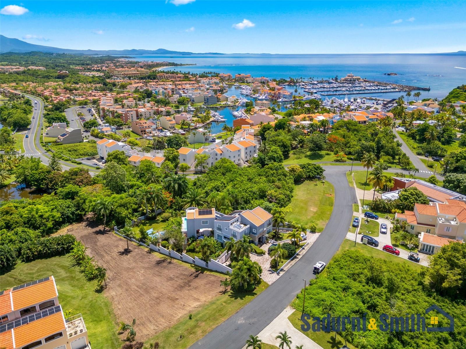 Residential lot for sale in Palmas del Mar Resort, located on Port Road St. The lot spans 1,903 square meters, making it an ideal space for building a home. The community offers a peaceful atmosphere, and Palmas del Mar provides access to golf clubs, a beach, a pool, horse stables, a hotel, restaurants, a bank, school, and much more. Feel free to contact us.